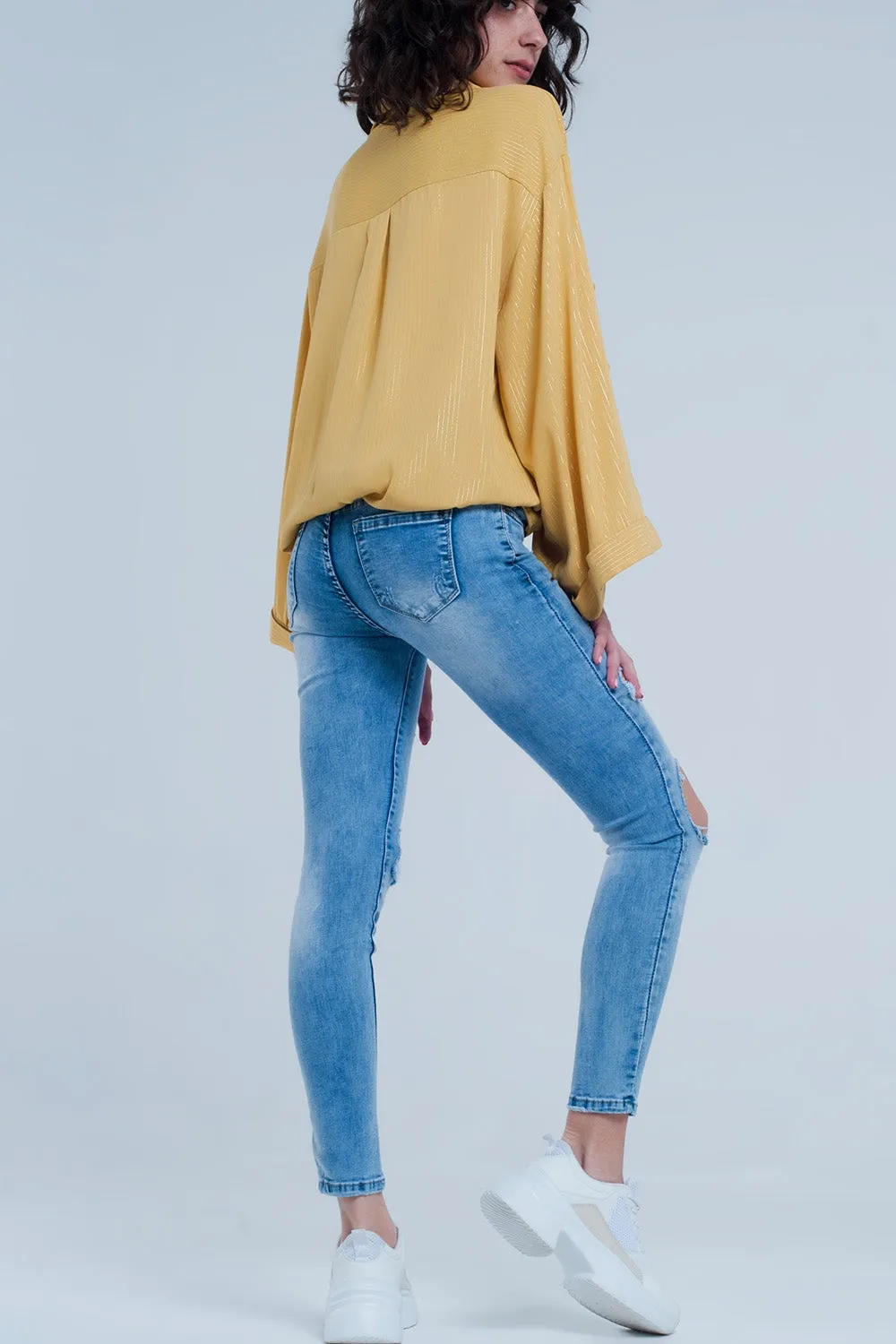 Light Denim Distressed Skinny Jeans