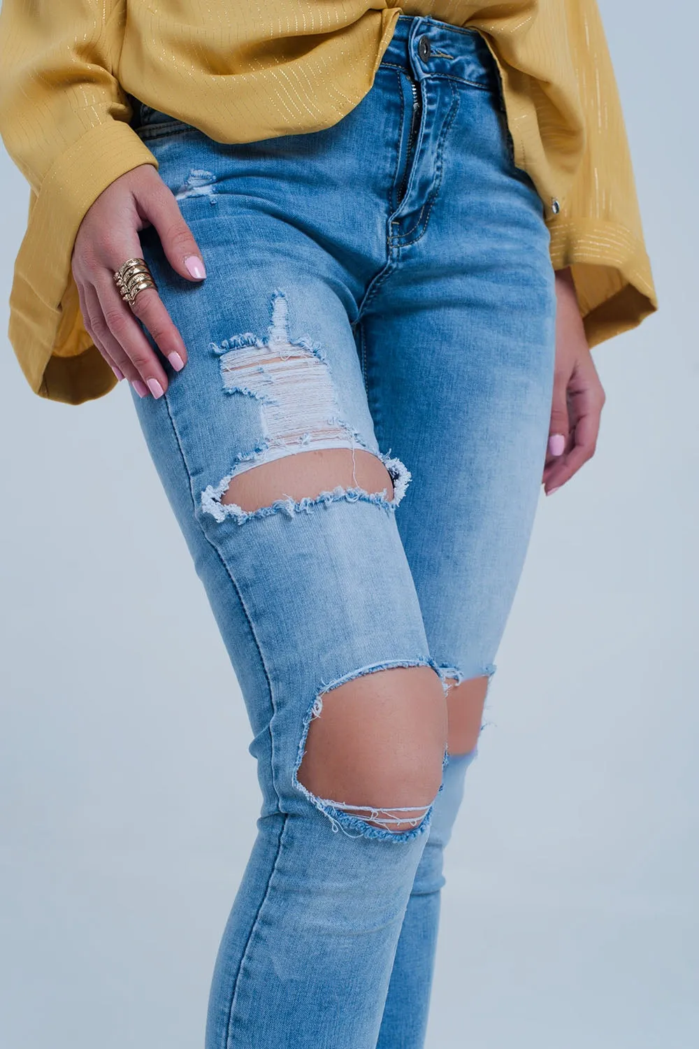 Light Denim Distressed Skinny Jeans